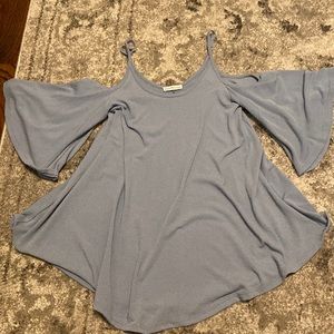 long, fancy, tank-top. 62% Polyester, 33% Rayon, 5% Spandex